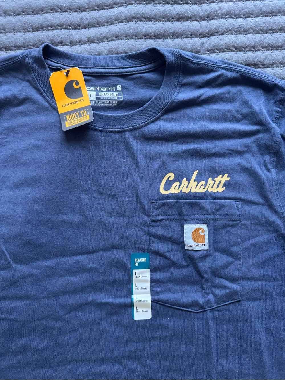 Carhartt Navy Short-Sleeve Pocket Tee with Yellow Logo